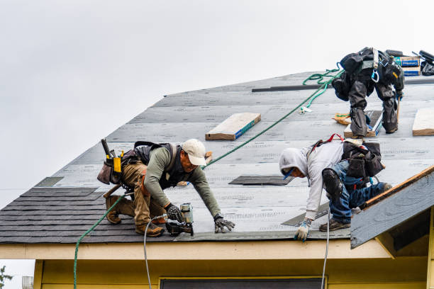Professional Gutter Installation technician working in Leverett, MA